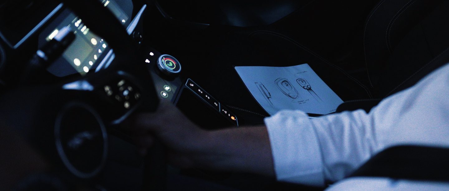 Man driving an electric car
