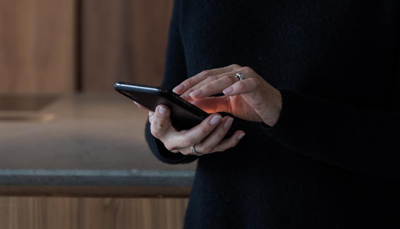 Woman holding a smartphone